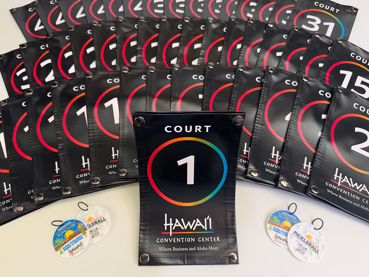31-court pickleball tournament at the Hawaii Convention Center with NetSnapz court ID banners